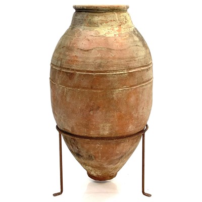 Lot 96 - A terracotta olive storage jar.