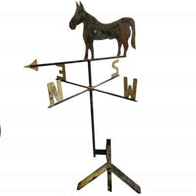 Lot 204 - A wrought iron weather vane decorated with a horse.