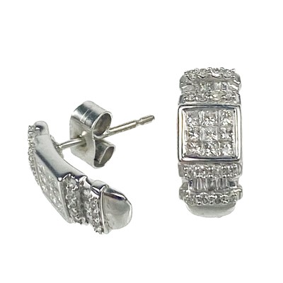 Lot 161 - A pair of 9ct white gold pavé diamond set panel stud earrings.