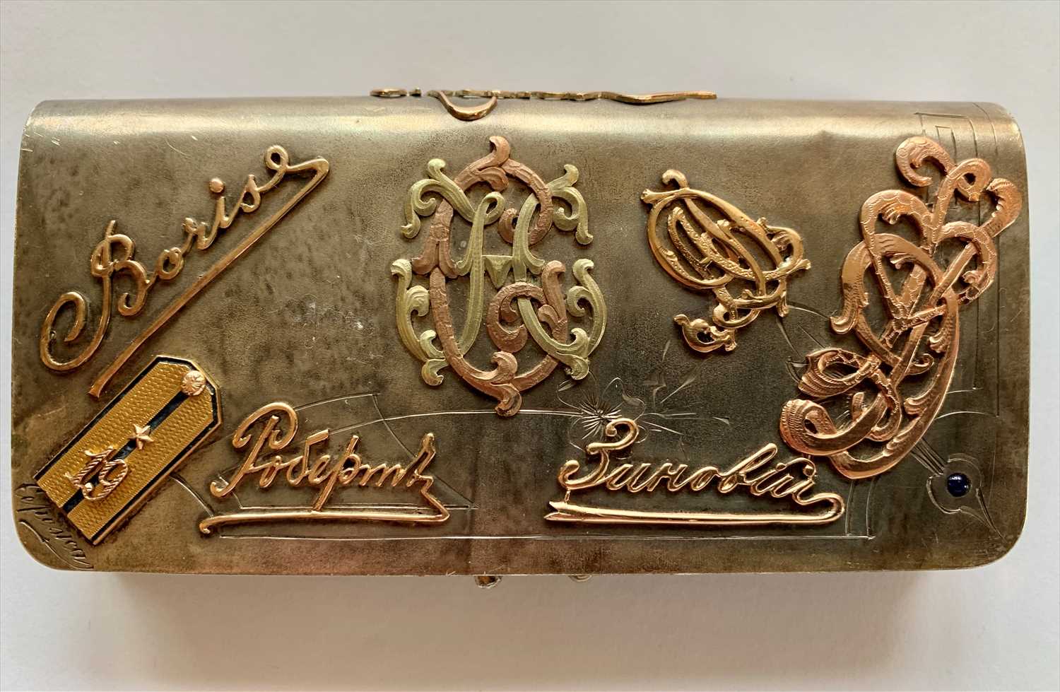 Lot 2463 - A Russian silver purse with applied gold in...