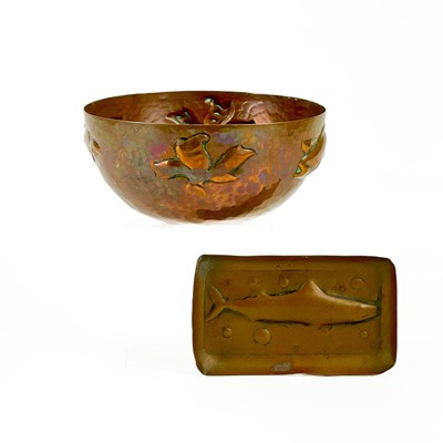 Lot 13 - A small Newlyn hammered copper bowl with repousse fish decoration.