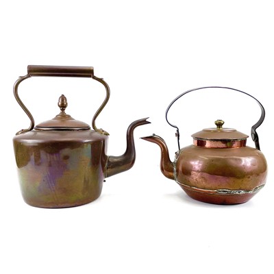 Lot 245 - A large copper kettle and lid with acorn finial.