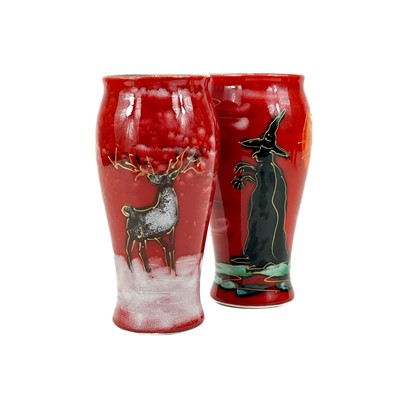 Lot 816 - An Anita Harris art pottery vase decorated with a  witch and an orange moon.