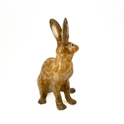 Lot 831 - A Winstanley Pottery model of a brown hare.