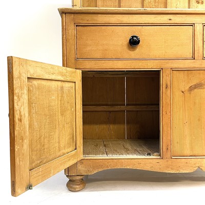 Lot 130 - A Victorian pine kitchen dresser.