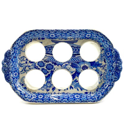 Lot 103 - A Minton Nankeen semi-china blue and white egg stand.