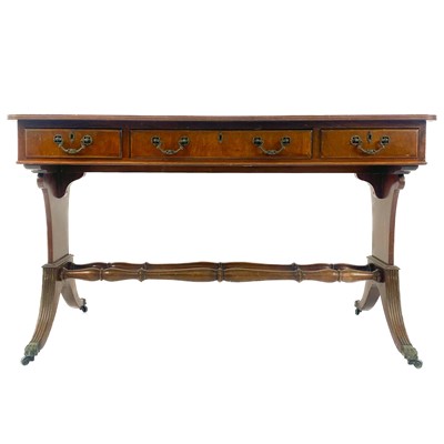 Lot 1940 - A Regency style mahogany leather top writing table.