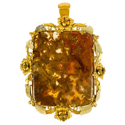 Lot 244 - An early 19th century pinchbeck mounted moss agate large pendant.