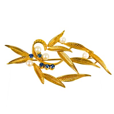 Lot 31 - A 1960's 9ct gold pearl and blue stone set foliate spray brooch.