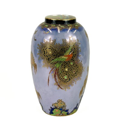 Lot 824 - A Carlton Ware Bird of Paradise and Tree pattern vase.