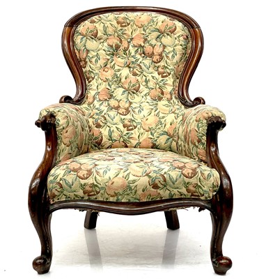 Lot 1832 - A Victorian walnut spoon back armchair.