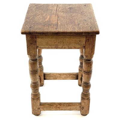 Lot 69 - An oak square occasional table.