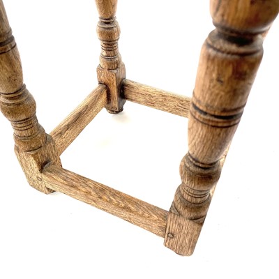 Lot 69 - An oak square occasional table.