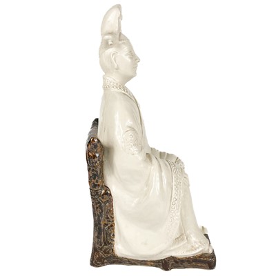 Lot 209 - A Kathleen Fisher porcelain figure of a seated Chinese Empress..