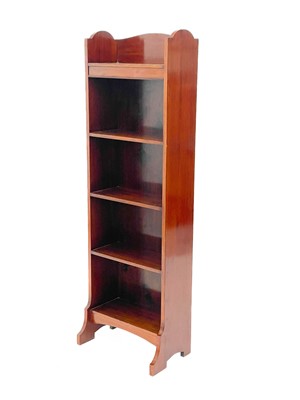 Lot 1865 - An Edwardian narrow mahogany open bookcase.