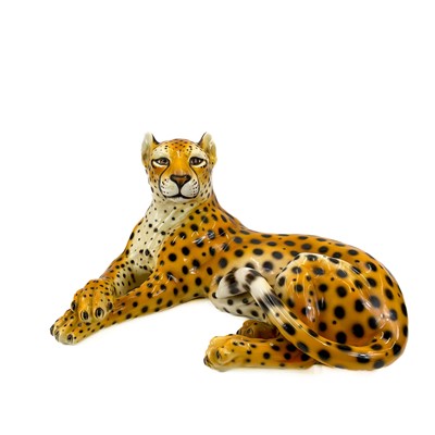 Lot 904 - An Italian made ceramic model of a resting cheetah circa 1970.