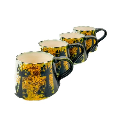 Lot 812 - A Newlyn Celtic pottery coffee service in the folk pattern.