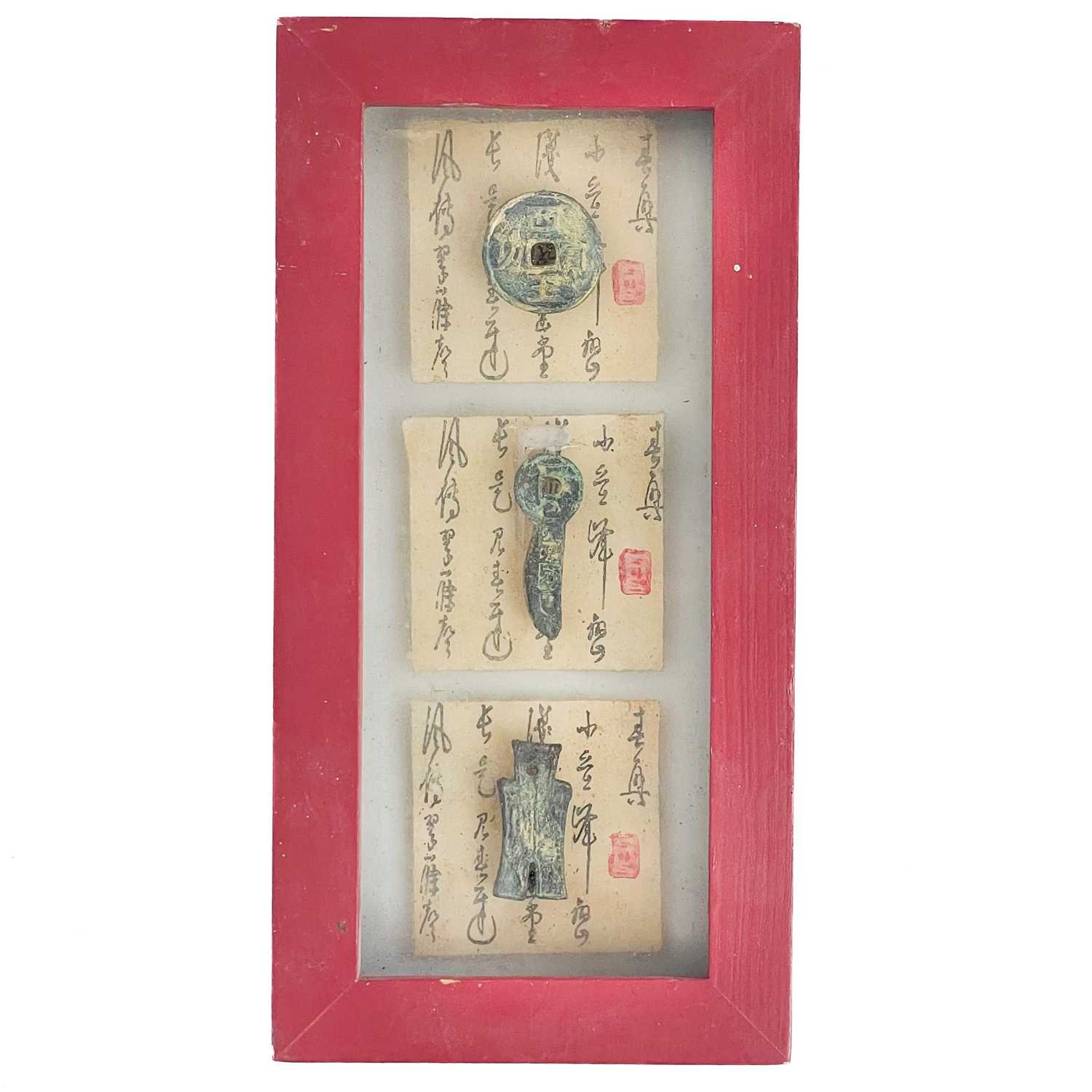 Lot 490 - A glazed cased of 'ancient' Chinese tokens.