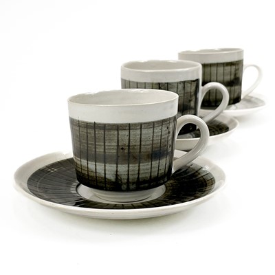 Lot 926 - A set of eight mid-century Briglin pottery coffee cups and saucers.