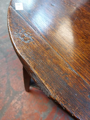 Lot 38 - An oak cricket table.