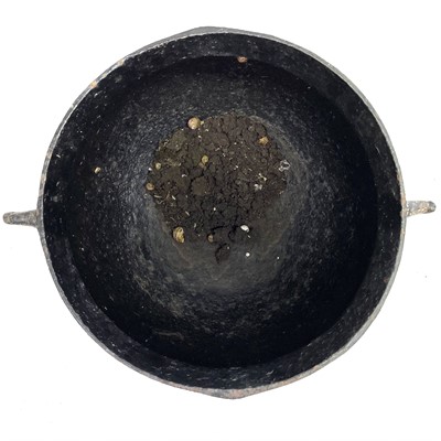 Lot 126 - A Victorian cast iron large twin handled cauldron.