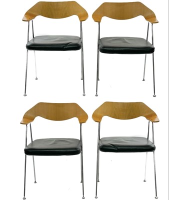 Lot 417 - Four After Robin Day elbow chairs.