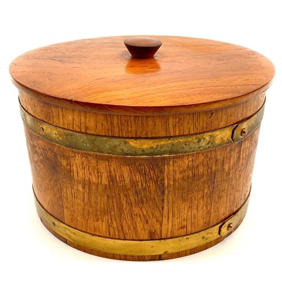 Lot 173 - A brass bound coopered teak storage jar and cover.