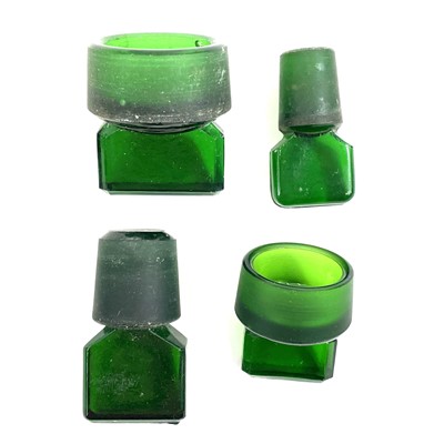 Lot 178 - Four green glass apothecary jars and stoppers.