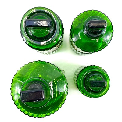Lot 178 - Four green glass apothecary jars and stoppers.
