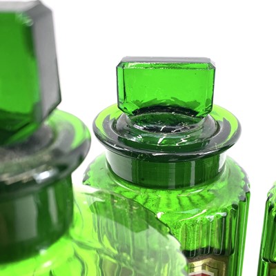 Lot 178 - Four green glass apothecary jars and stoppers.