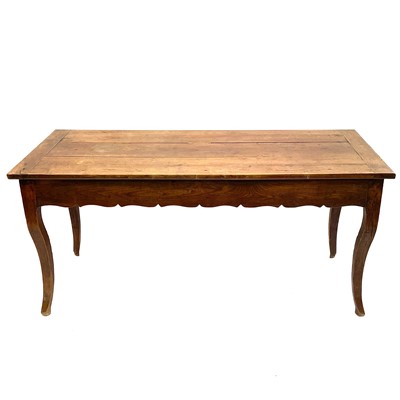 Lot 35 - A French fruitwood farmhouse kitchen table.
