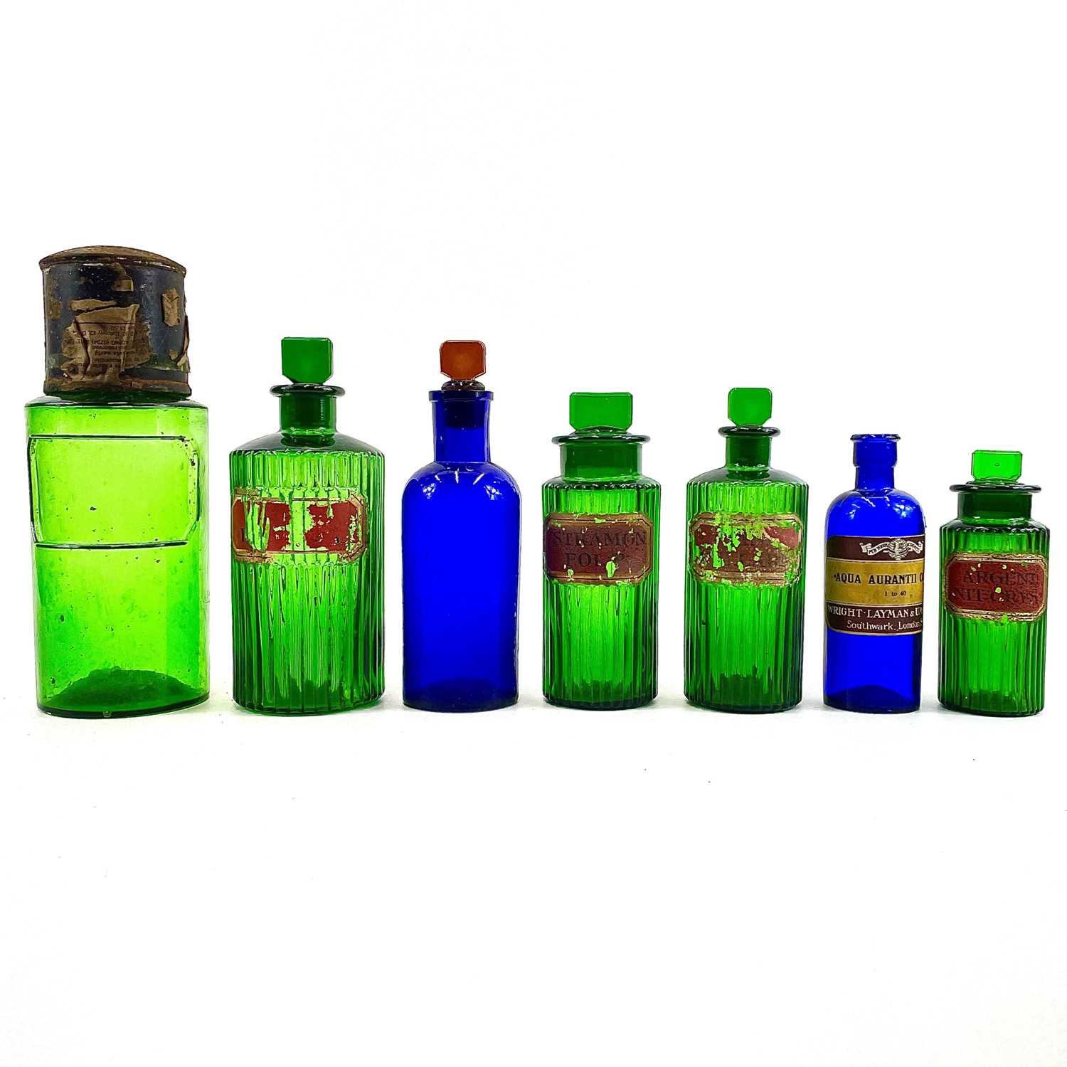 Lot 179 - Green and blue glass apothecary bottles.