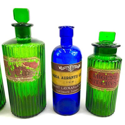 Lot 179 - Green and blue glass apothecary bottles.