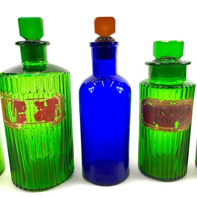 Lot 179 - Green and blue glass apothecary bottles.