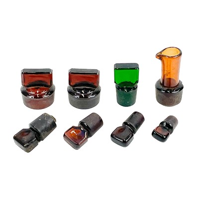 Lot 910 - A glass muller, with a ground base, and a pestle and mortar.