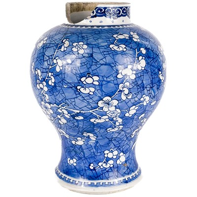 Lot 566 - A Chinese blue and white porcelain prunus pattern baluster vase, 18th/19th century.