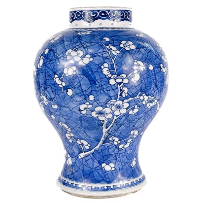 Lot 566 - A Chinese blue and white porcelain prunus pattern baluster vase, 18th/19th century.