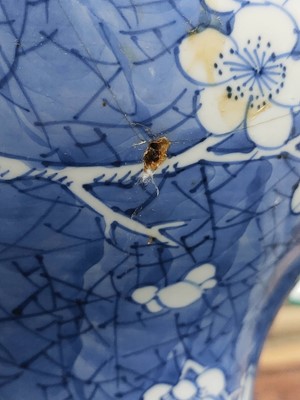 Lot 566 - A Chinese blue and white porcelain prunus pattern baluster vase, 18th/19th century.