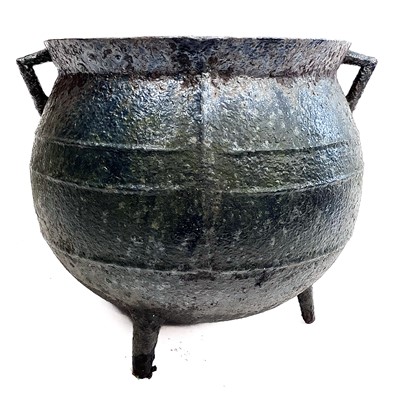 Lot 209 - A Victorian cast iron twin handled cauldron.