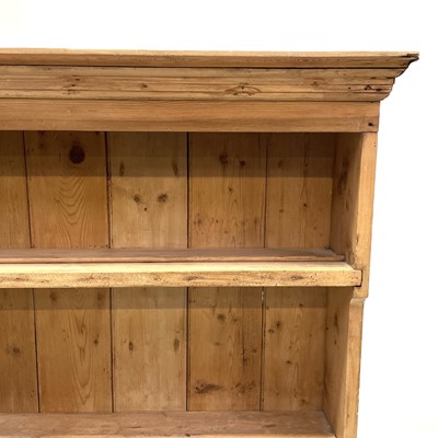 Lot 217 - A 19th century pine dresser plate rack.