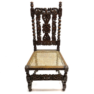 Lot 218 - A 19th century high back oak hall chair.