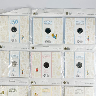 Lot 42 - UK 50 pence Uncirculated Beatrix Potter coins in Royal Mint packaging (x11)