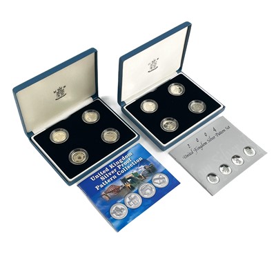 Lot 54 - UK Silver Proof '£1 Size' Pattern Coins for 2003 and 2004 in Royal Mint Boxes.