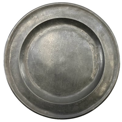 Lot 230 - A large 18th century circular pewter charger.