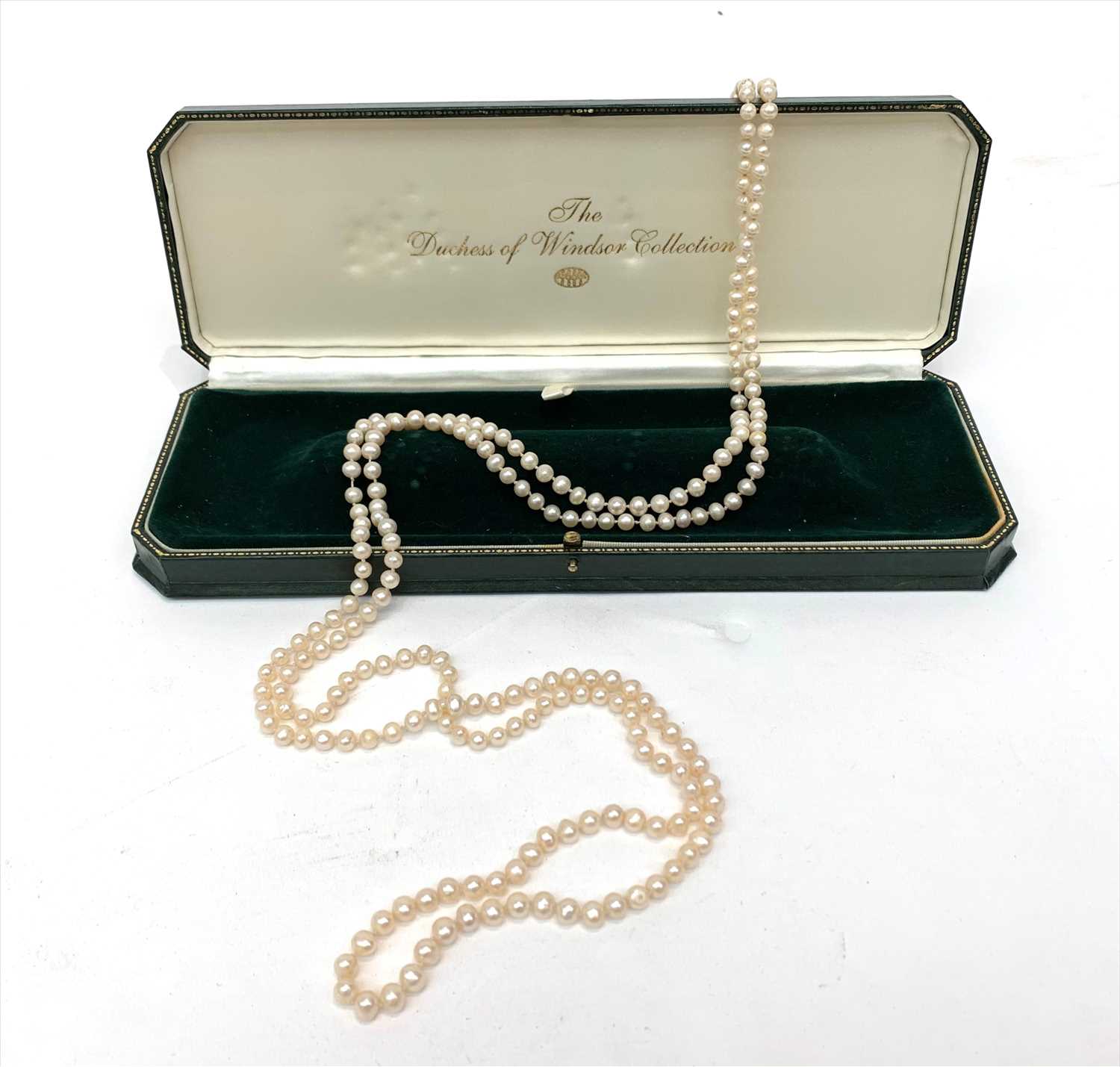 Lot 2738 - A long rope of pearls (each approximately...