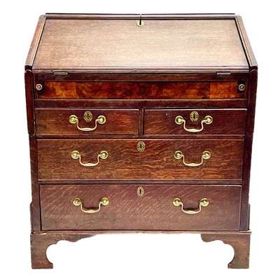 Lot 260 - A George II oak bureau, the fall front opening to reveal a fitted interior.