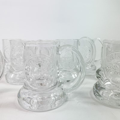 Lot 847 - A collection of twentytwo Dartington commemorative glass tankards.