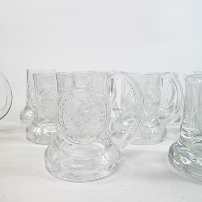 Lot 847 - A collection of twentytwo Dartington commemorative glass tankards.