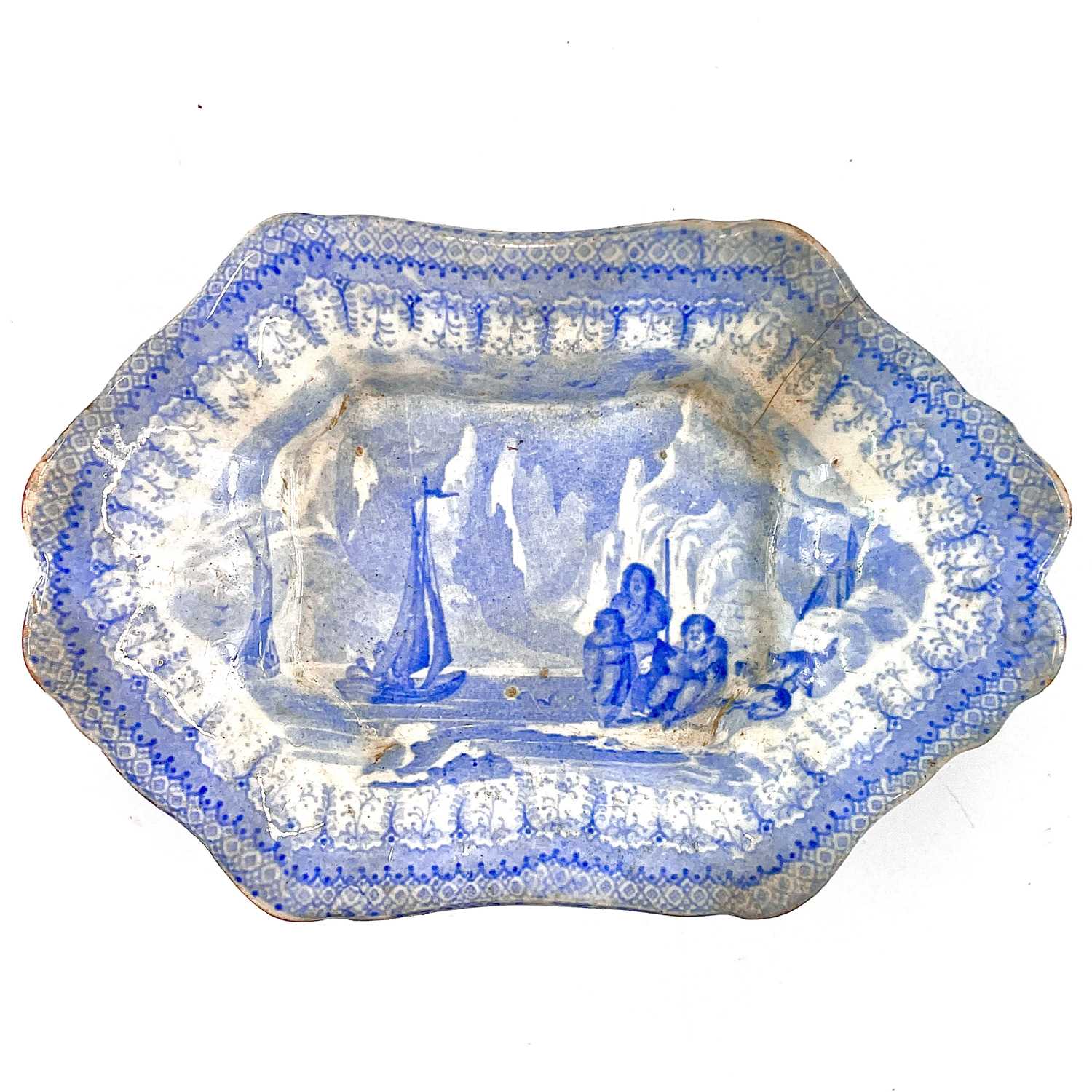 Lot 262 - A rare 19th century pearlware shaped dish printed with the Arctic Scenery Series pattern.