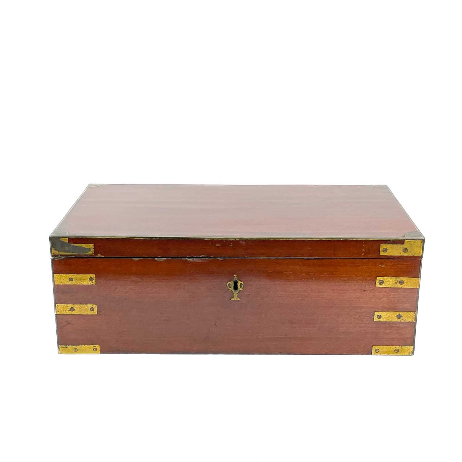 Lot 67 - A Georgian mahogany and brass bound campaign writing slope by Gaimes.
